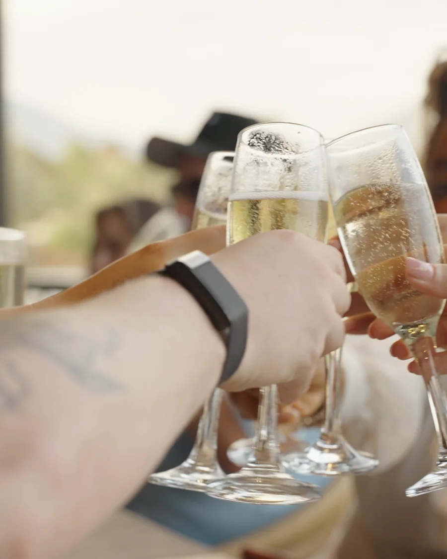 Colleagues raising a glass together on the Marbella trip