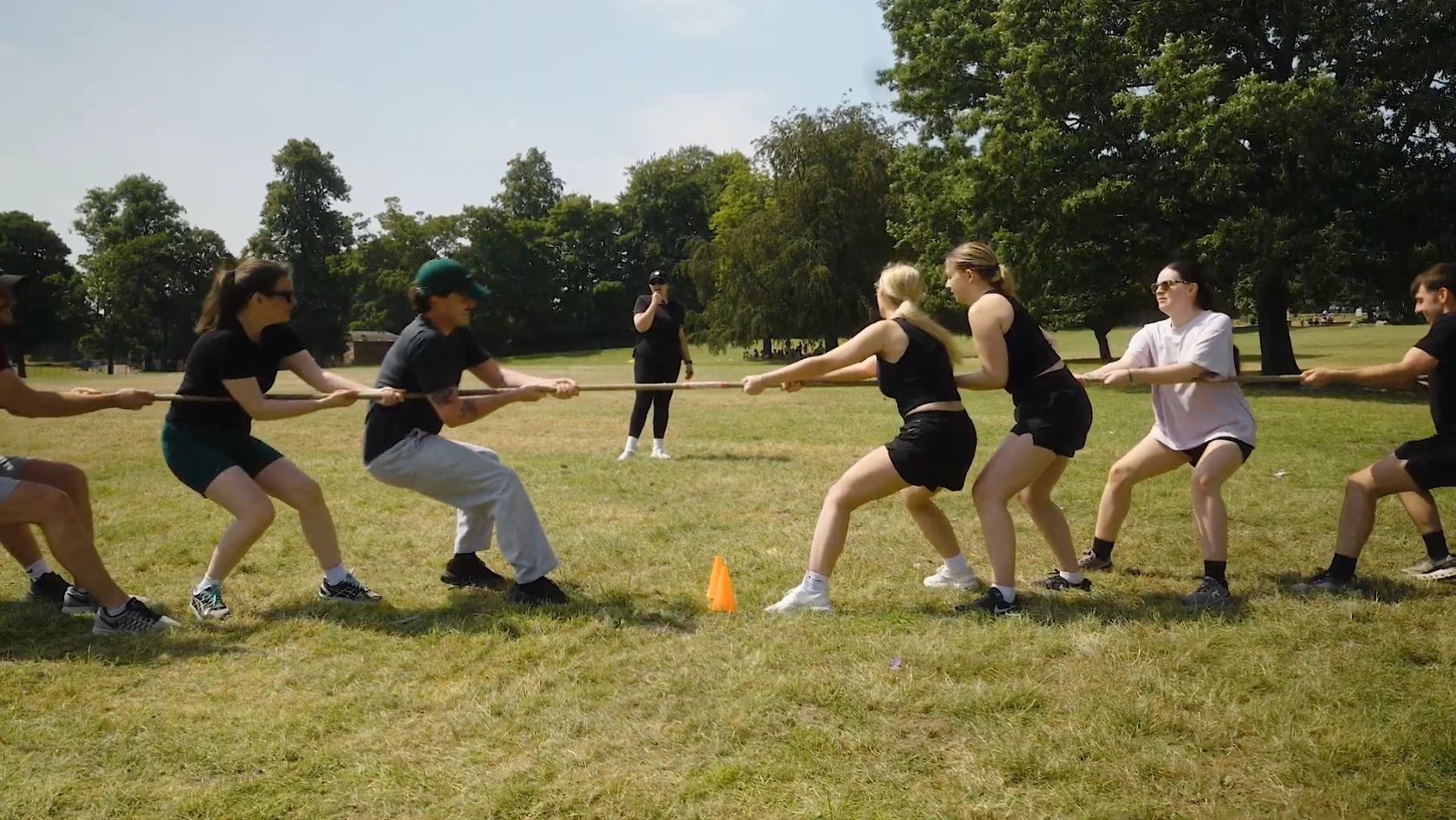 The Leadly team playing tug of war on a Good Vibes Day