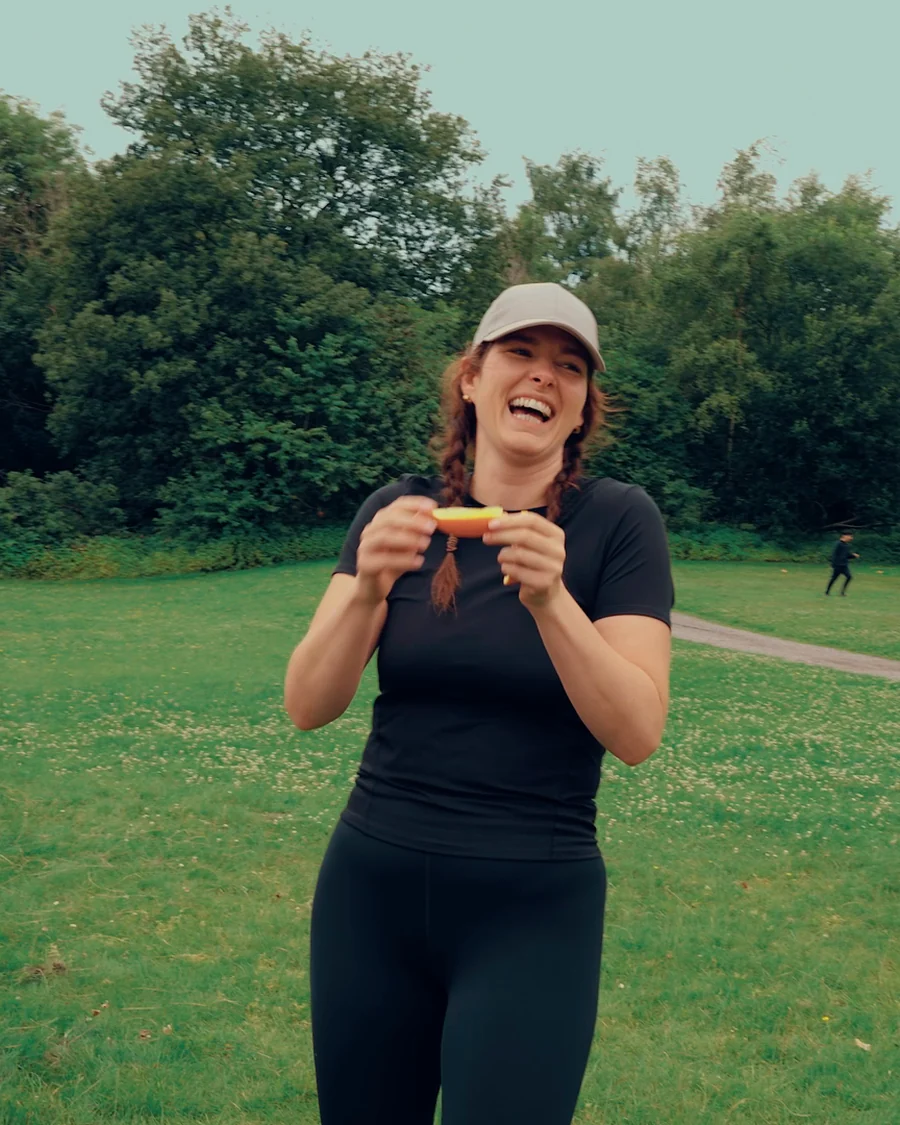 A colleague laughing as she takes the lemon challenge on Good Vibes Day
