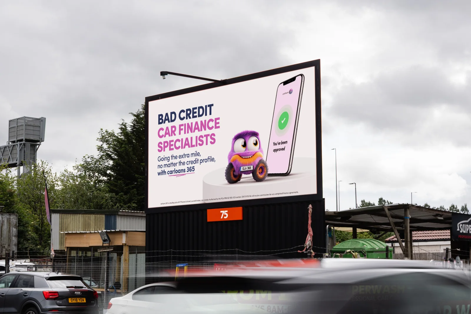 A carloans365 digital billboard in Glasgow reading “Bad credit car finance specialists”